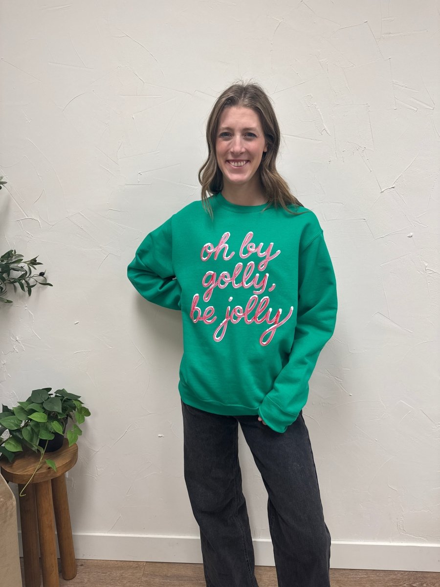 Front view of model wearing Oh By Golly Be Jolly graphic holiday sweatshirt — Three:Twelve Boutique