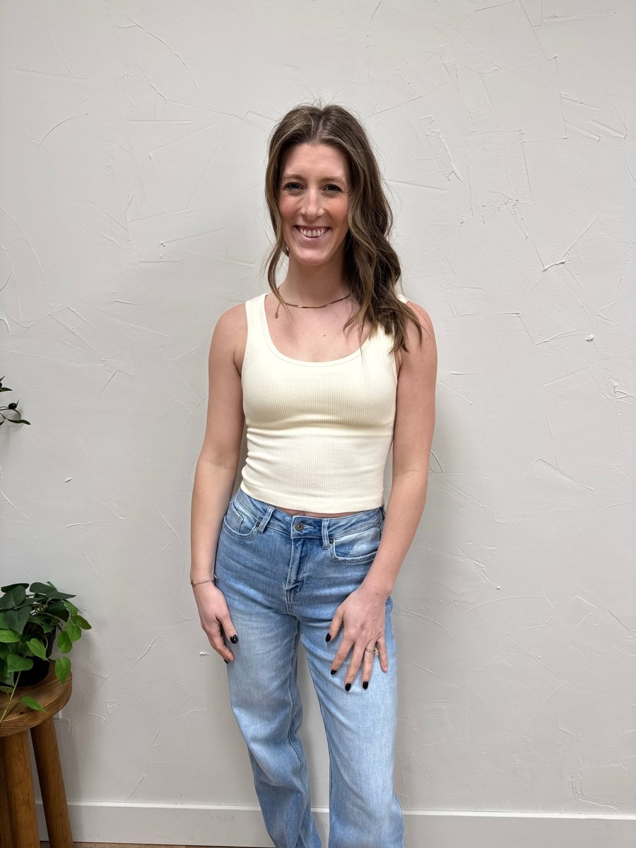 Lifestyle shot of model wearing padded tank top styled with casual outfit — Three:Twelve Boutique