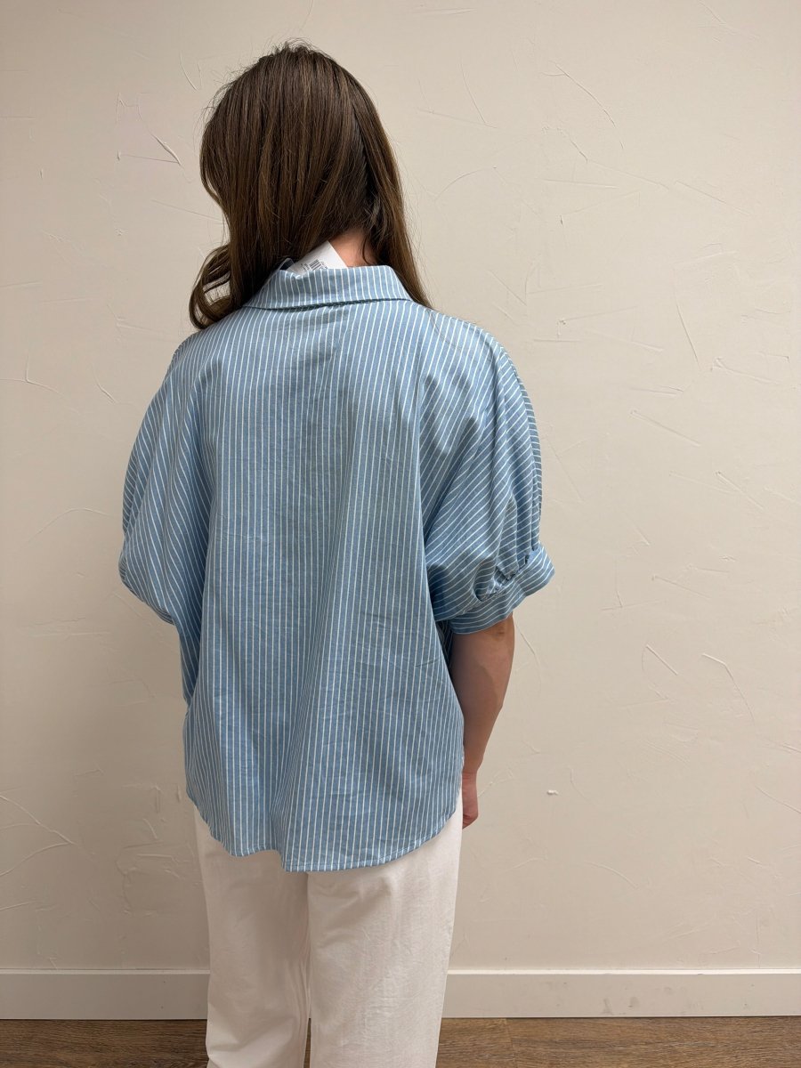 Back view of model wearing Pinstripe Denim Button Down Top for Women