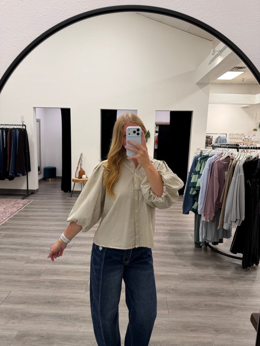 Model styling Pleated Button Down Shirt for Women with a chic everyday outfit