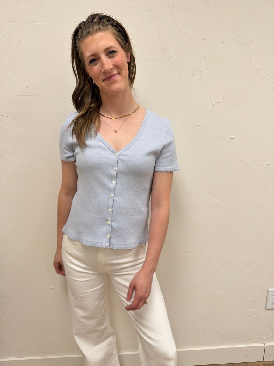 Front view of model wearing Pointelle V Neck Top showing textured knit detail — Three Boutique
