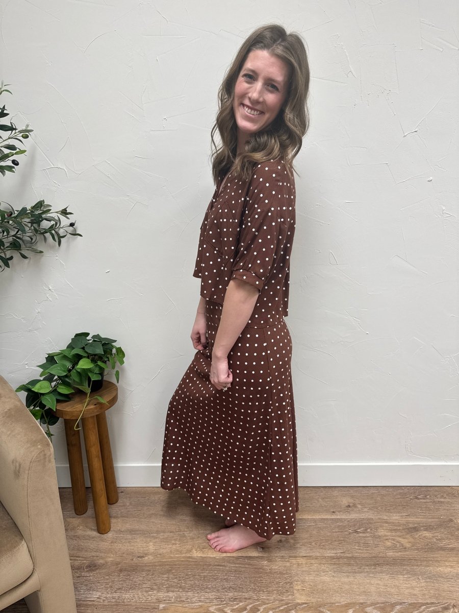 Side view of A-line skirt showing flare and movement — Three:Twelve Boutique