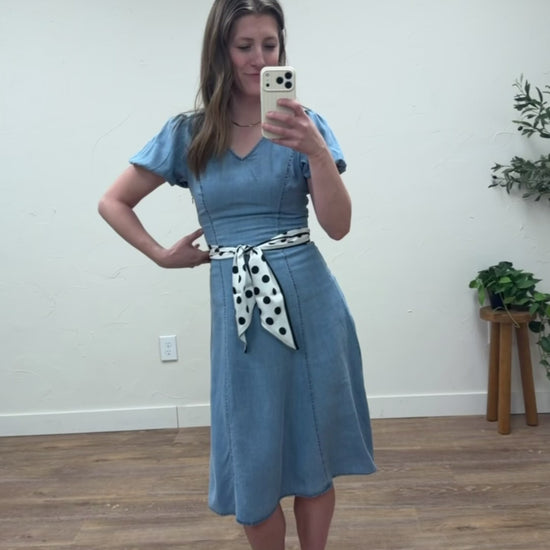 Lifestyle video of model wearing The Braxton Dress styled for everyday wear — Three:Twelve Boutique