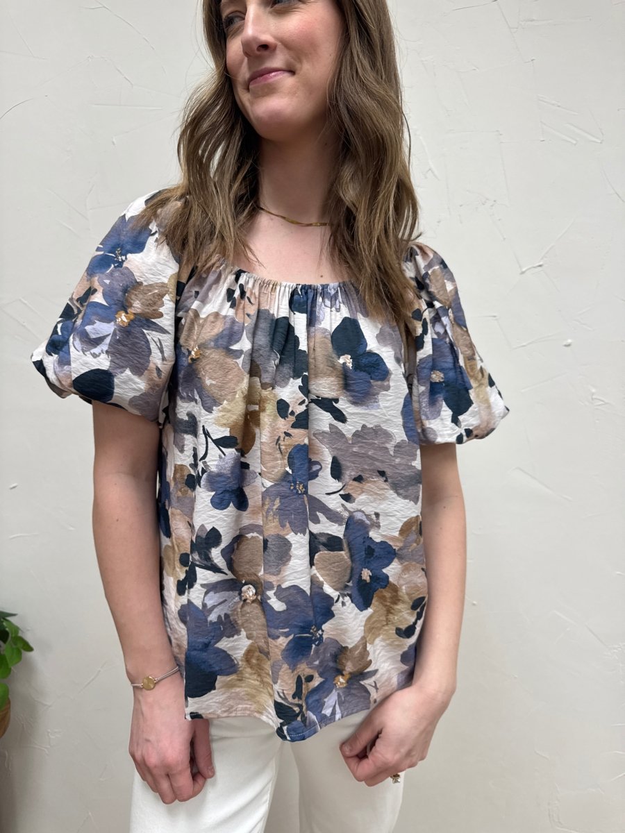 Front view of puff balloon sleeve woven top on model showing statement sleeves — Three:Twelve Boutique