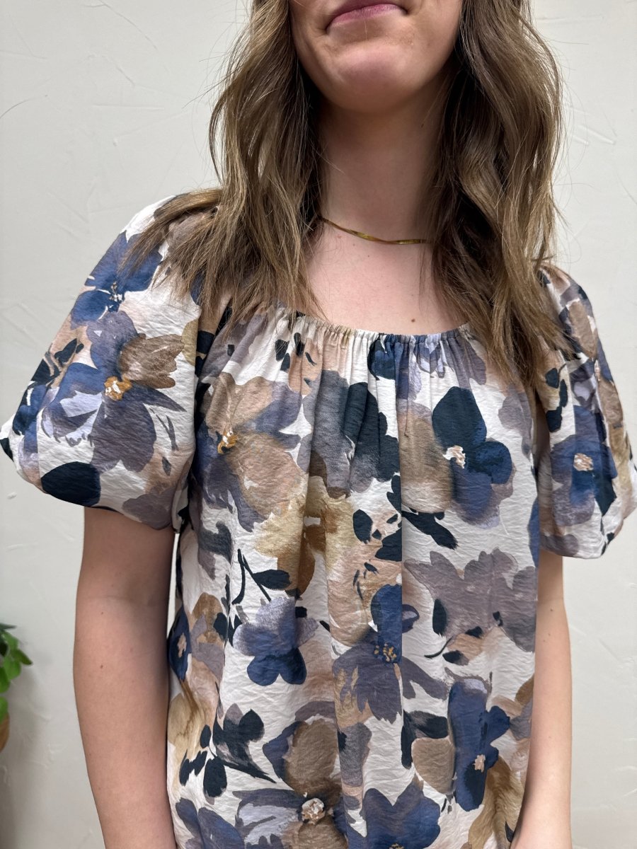 Close up of woven fabric texture and gathered puff sleeve detail — Three:Twelve Boutique