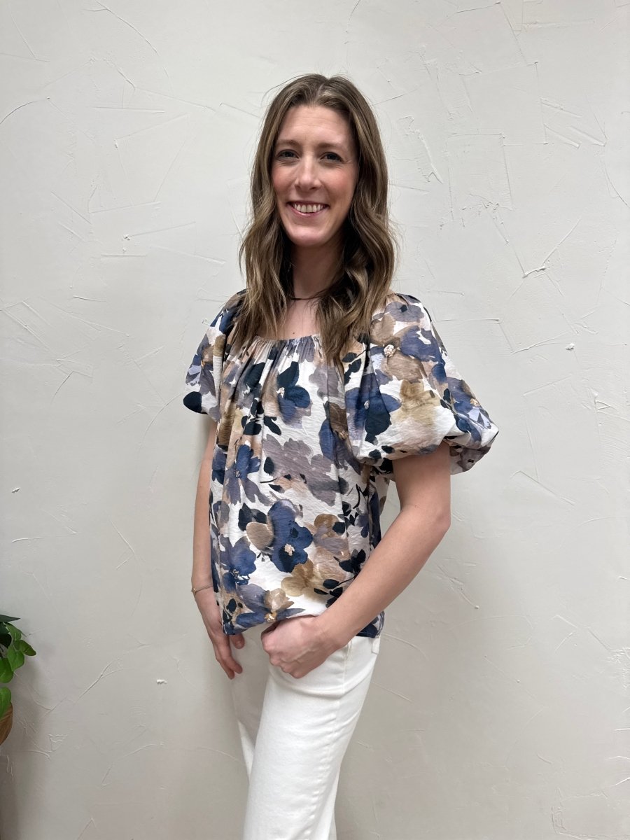 Side angle view of balloon sleeve woven top showing volume sleeve shape — Three:Twelve Boutique