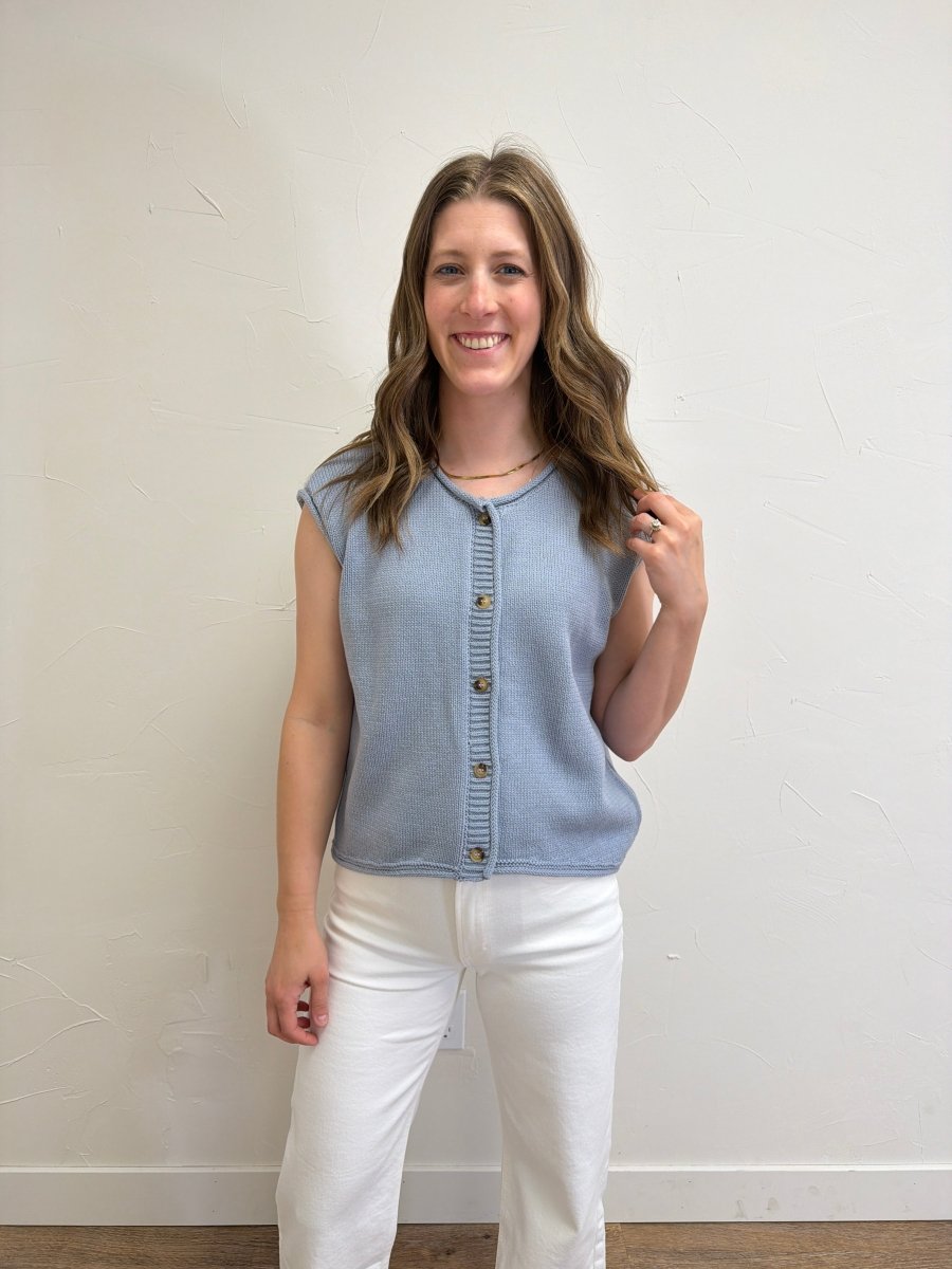 Front view of model wearing Raw Edge Sleeveless Button Down Knit Cardigan for Women