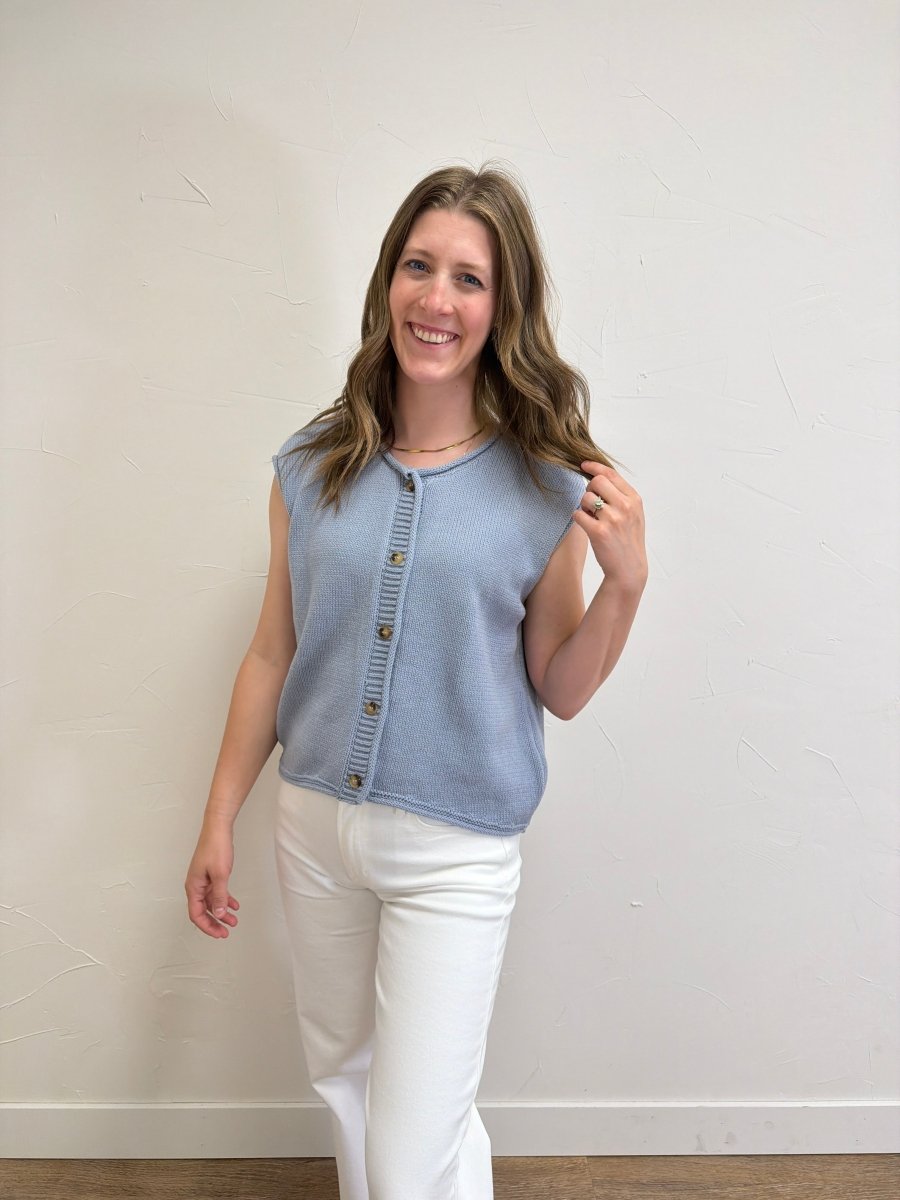 Front view of model wearing Raw Edge Sleeveless Button Down Knit Cardigan for Women