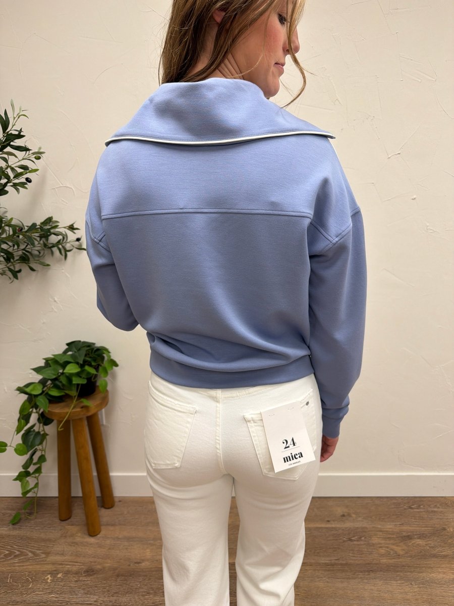 Back view of model wearing Regalia Pullover showing relaxed silhouette — Three:Twelve Boutique