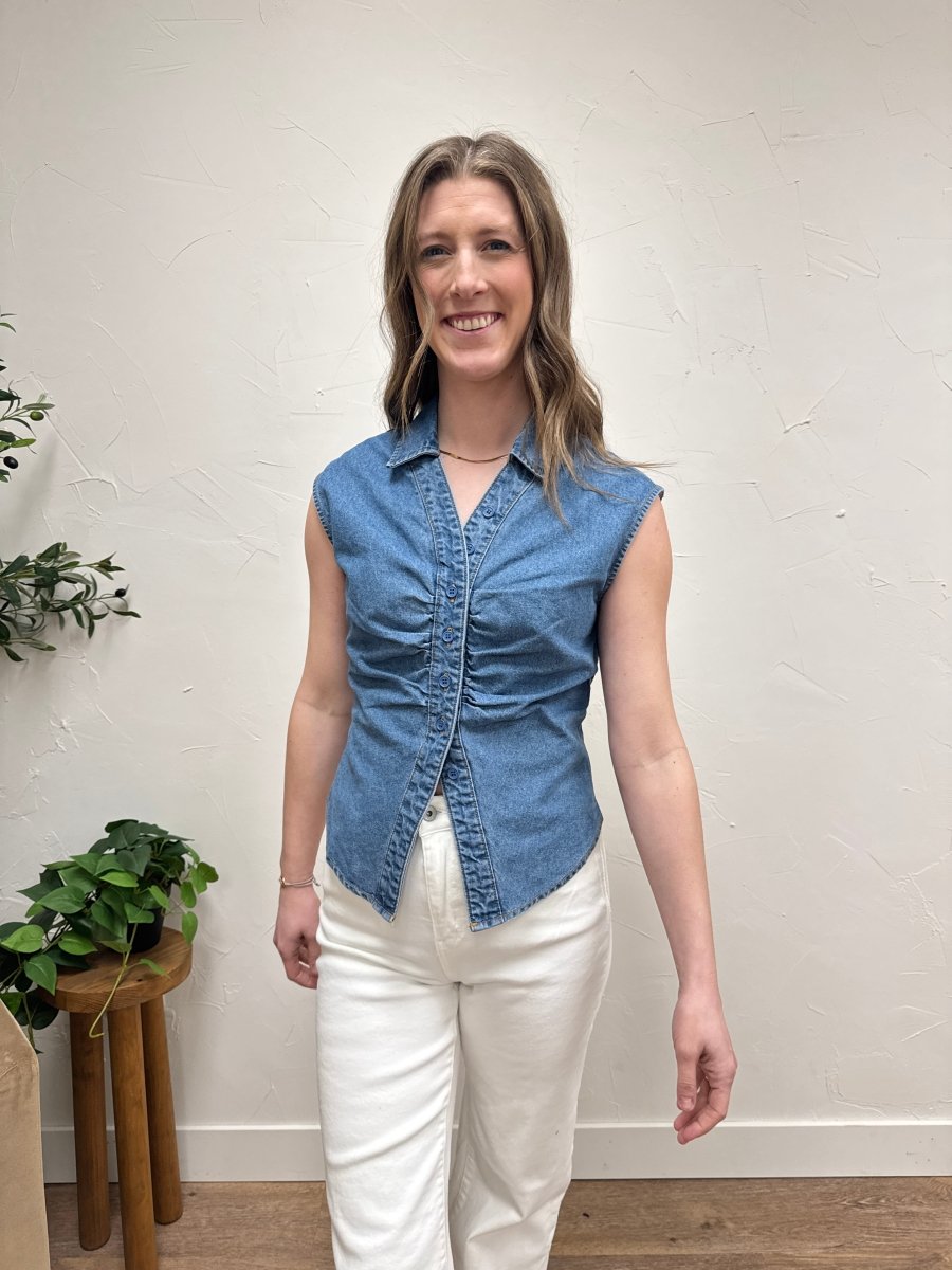 Lifestyle shot of model wearing ruched button up top styled with casual outfit — Three:Twelve Boutique