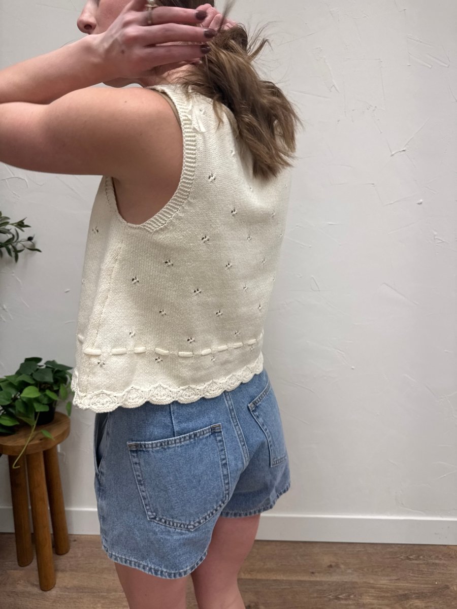 Back view of model wearing sleeveless sweater tank showing clean fit — Three:Twelve Boutique