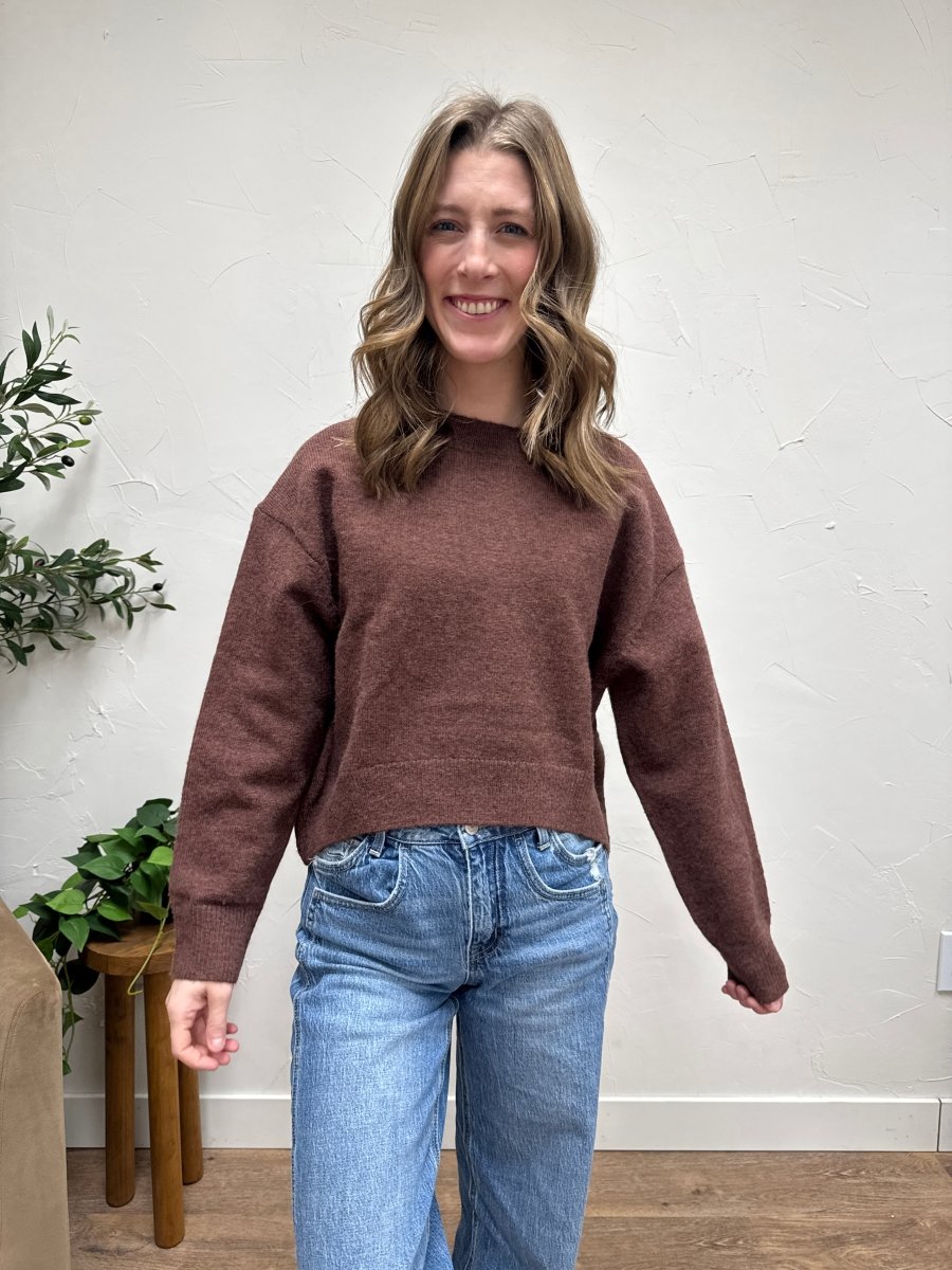 Front view of model wearing seam detail round neck sweater in soft knit fabric — Three:Twelve Boutique