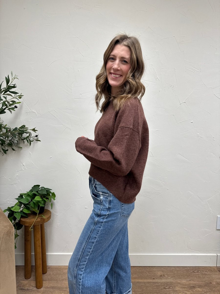 Side angle view of round neck sweater showing fit and sleeve length — Three:Twelve Boutique