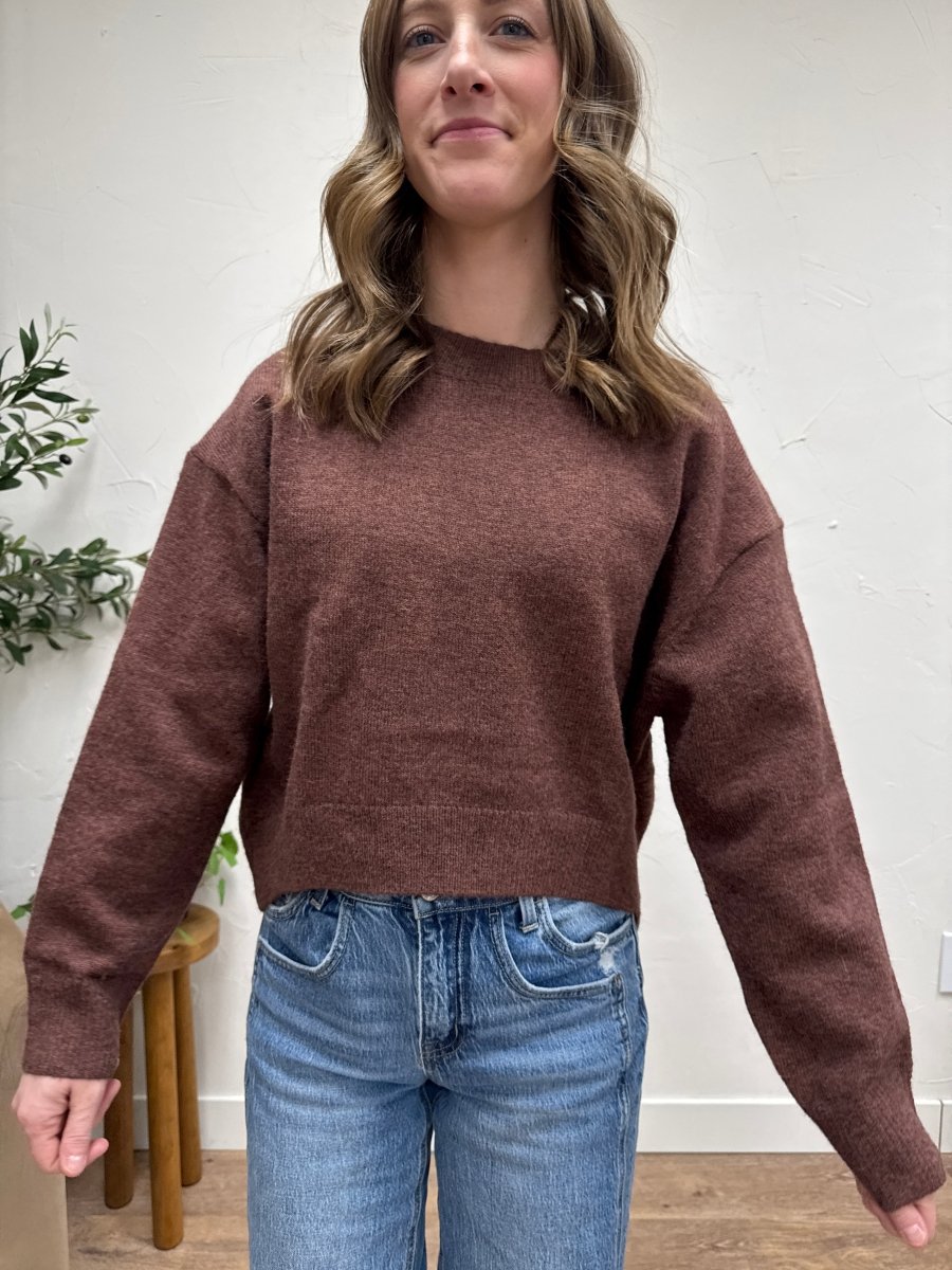 Front view of model wearing seam detail round neck sweater in soft knit fabric — Three:Twelve Boutique