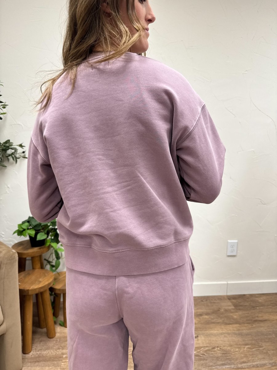 Back view of model wearing Serenity fleece sweatshirt showing clean silhouette — Three:Twelve Boutique