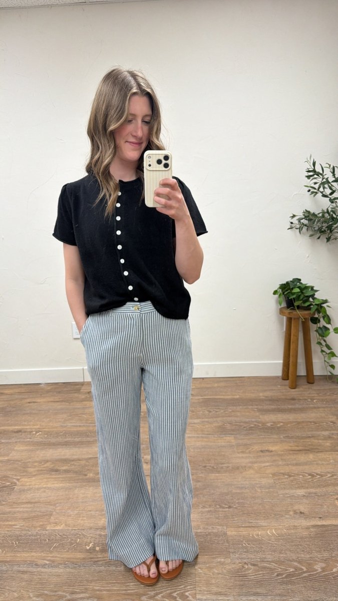 Lifestyle shot of model styling short sleeve cardigan with casual outfit — Three:Twelve Boutique