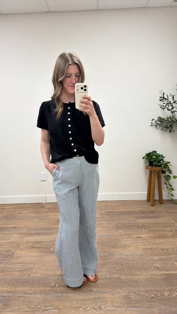 Lifestyle shot of model styling short sleeve cardigan with casual outfit — Three:Twelve Boutique