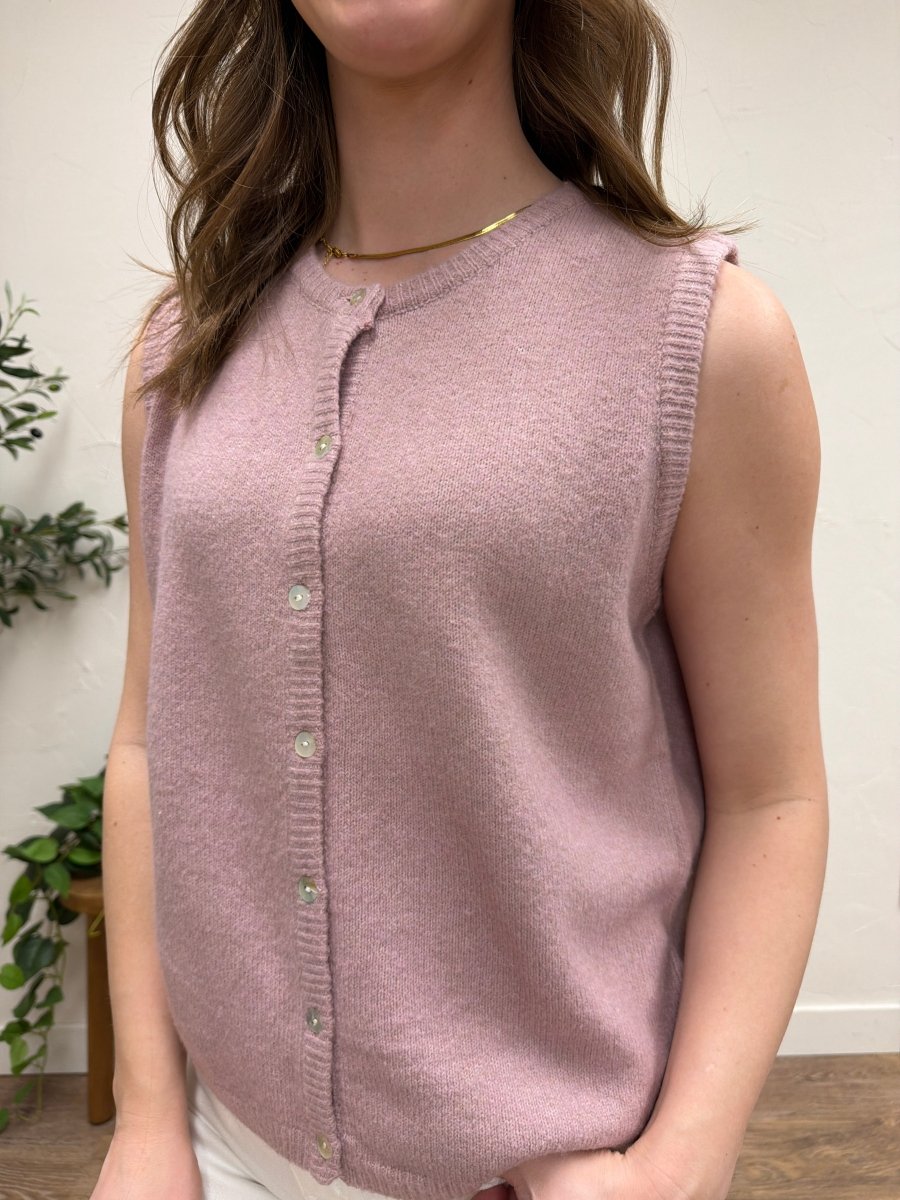 Close up of knit fabric texture on sleeveless sweater cardigan — Three:Twelve Boutique