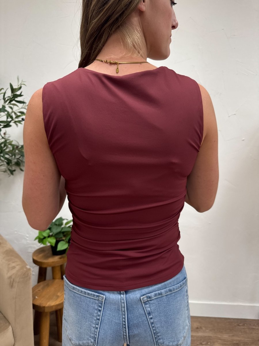 Back view of ruched detail knit top on model — Three:Twelve Boutique