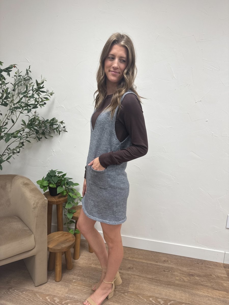 Side view of sleeveless sweater vest showing arm opening and fit — Three:Twelve Boutique