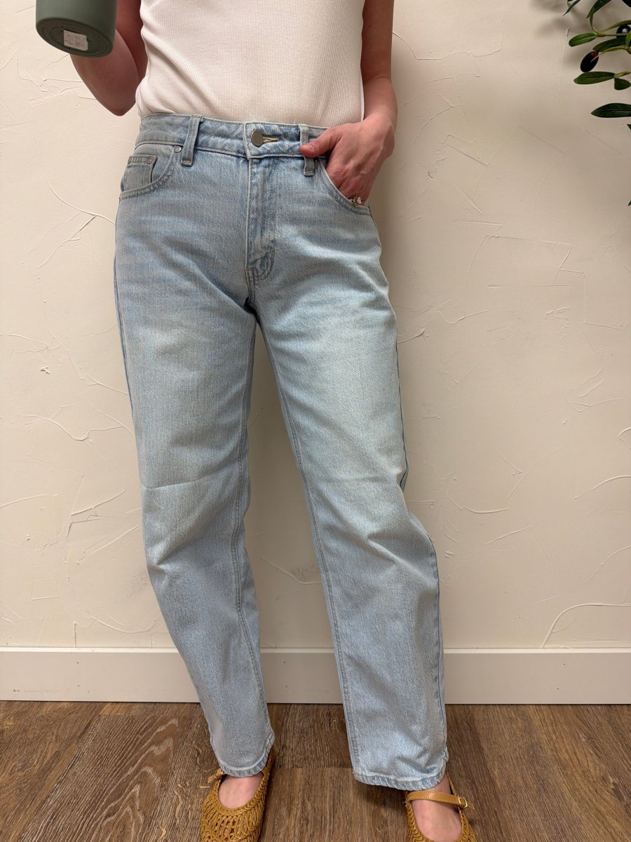 Front view of model wearing slight barrel straight denim jeans showing relaxed fit — Three:Twelve Boutique