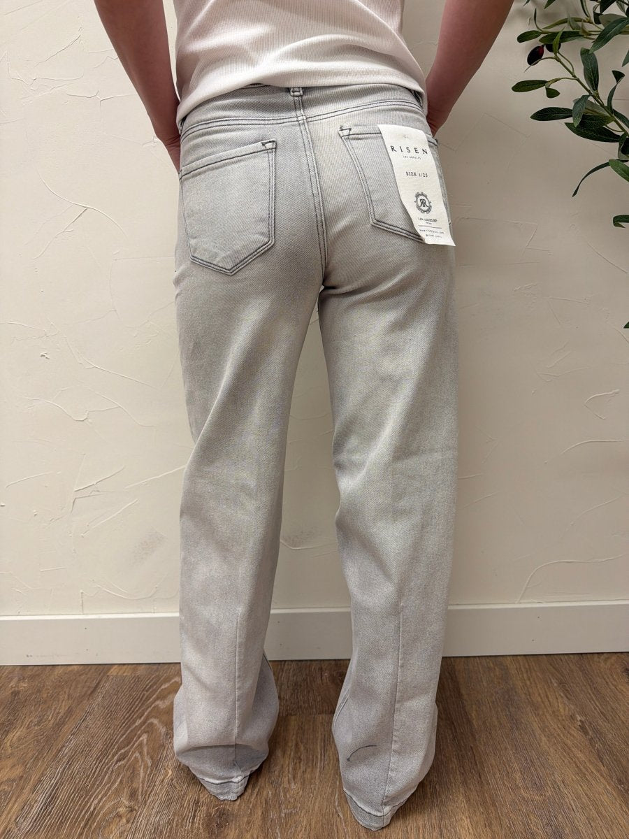 Back view of model wearing Risen Baggy Jeans highlighting pockets and loose silhouette — Three:Twelve Boutique