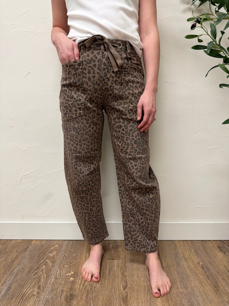 Close-up of leopard print fabric detail on slouchy crop barrel jeans — Three:Twelve Boutique