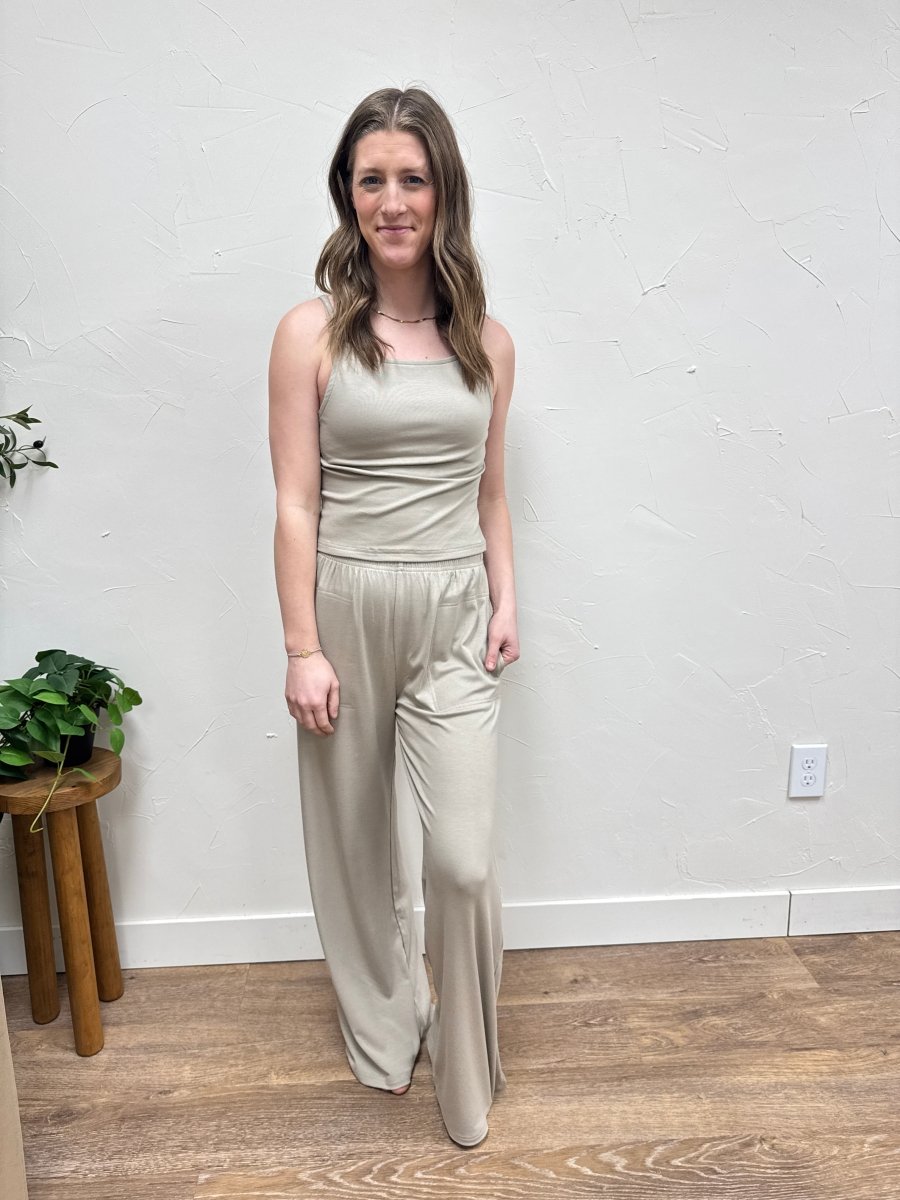 Lifestyle shot of model wearing tank top with matching pants set — Three:Twelve Boutique