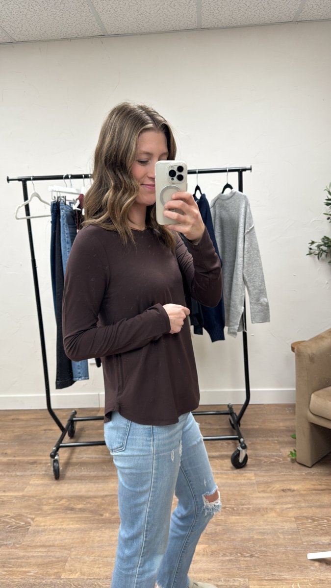 Side angle view of Stassia Top showing relaxed flow and sleeve design — Three:Twelve Boutique