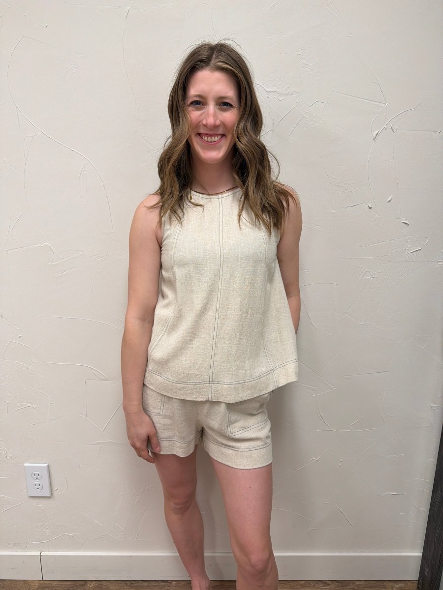 Front view of model wearing stitch panel detail sleeveless top showing relaxed fit — Three:Twelve Boutique