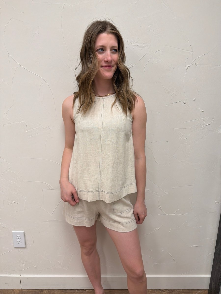 Front view of model wearing stitch panel detail sleeveless top showing relaxed fit — Three:Twelve Boutique