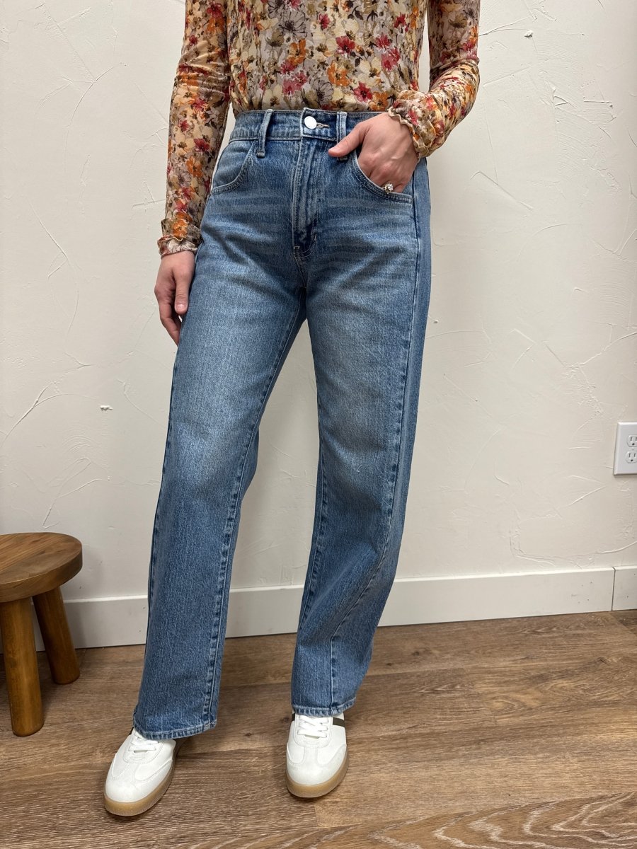 Front view of model wearing barrel twist jeans showing high rise and relaxed leg shape — Three:Twelve Boutique