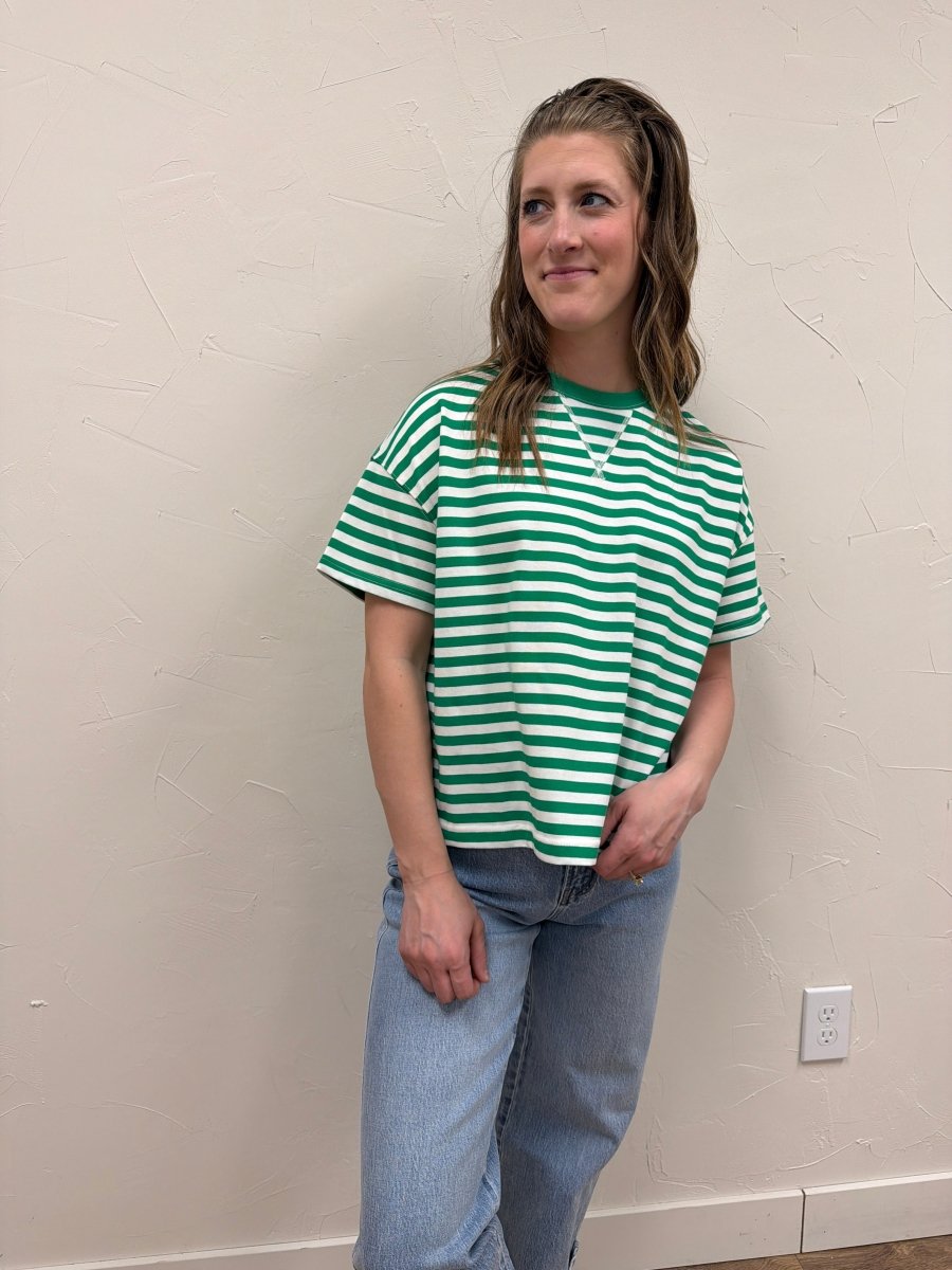 Lifestyle shot of model wearing striped contrast knit tee with casual denim — Three:Twelve Boutique