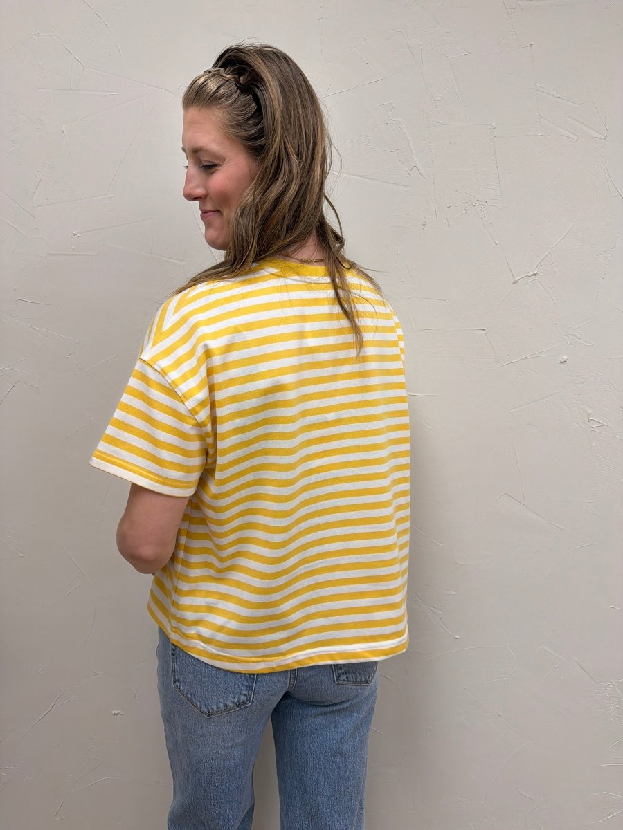 Back view of striped contrast knit tee on model showing relaxed silhouette — Three:Twelve Boutique