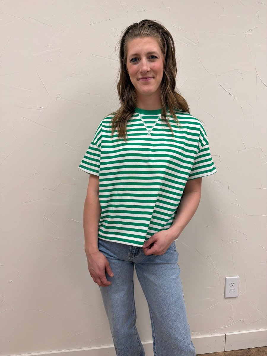Lifestyle shot of model wearing striped contrast knit tee with casual denim — Three:Twelve Boutique