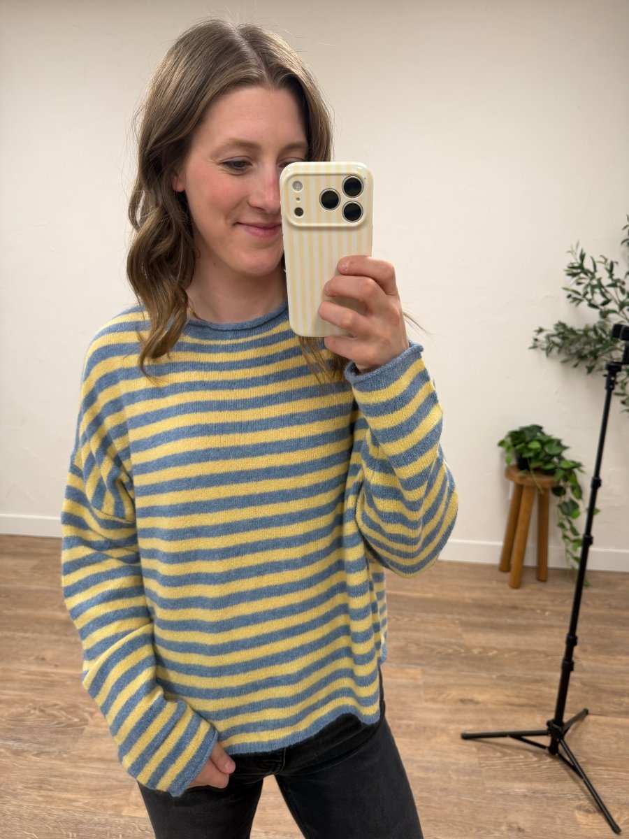 Front view of model wearing striped pullover sweater showing relaxed fit — Three:Twelve Boutique