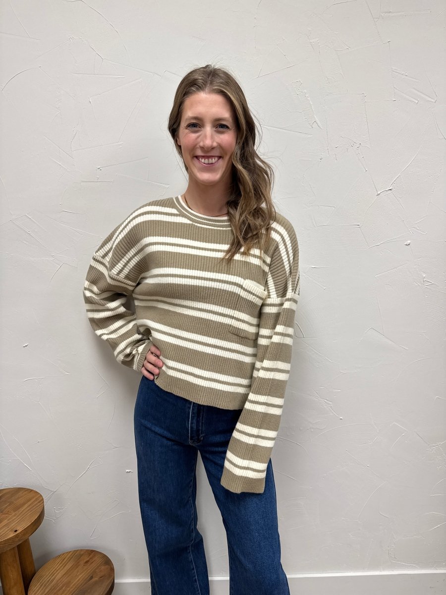 Front view of model wearing striped sweater showing horizontal stripe pattern — Three:Twelve Boutique