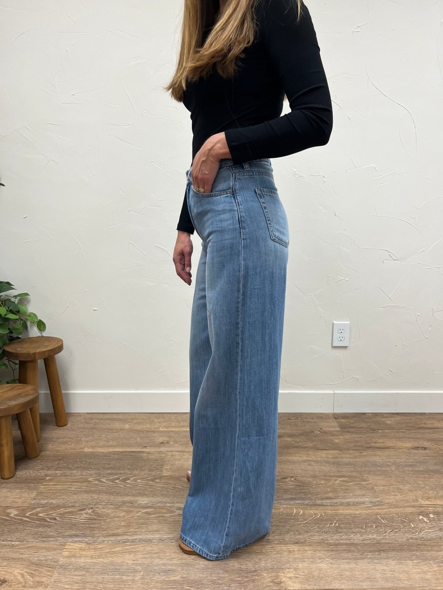 Side view of super high rise wide leg jeans showing silhouette and length — Three:Twelve Boutique