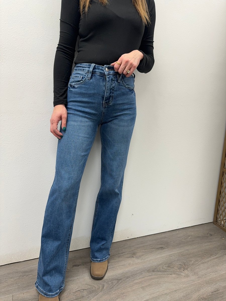 Front view of model wearing super high rise wide leg denim jeans — Three:Twelve Boutique