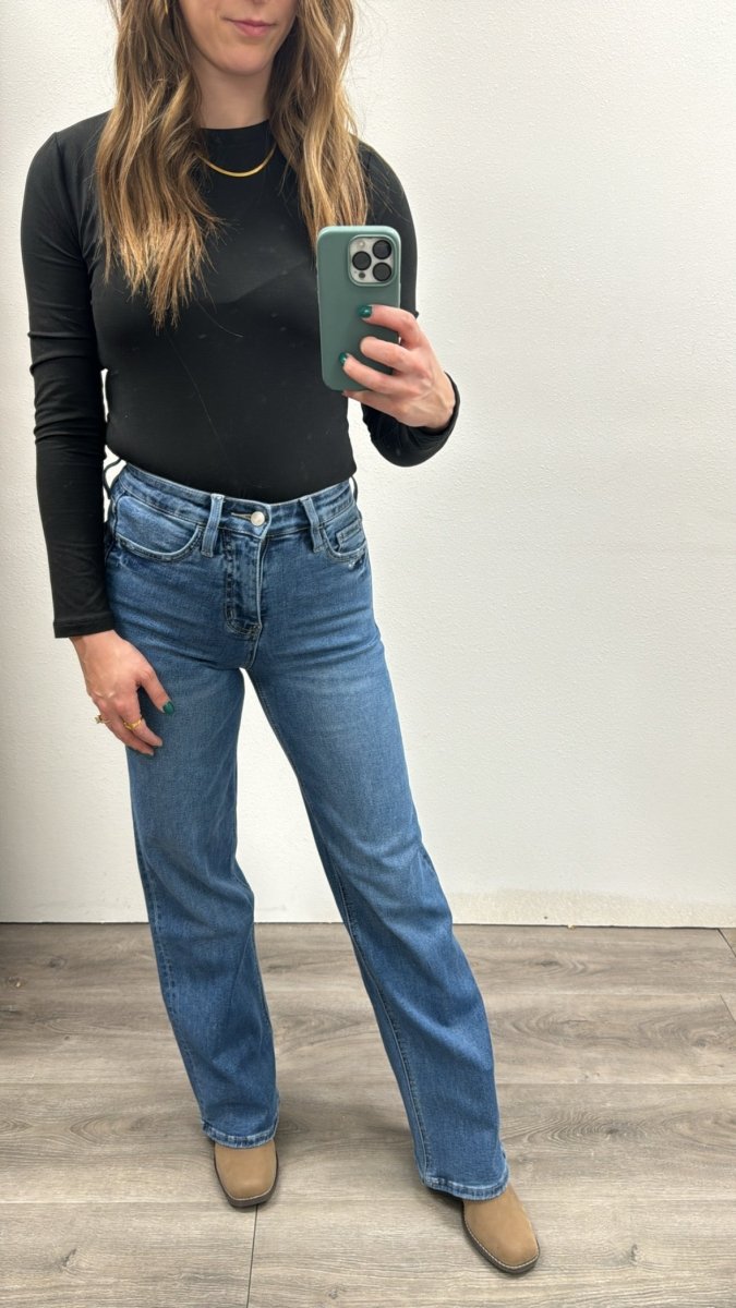Lifestyle shot of model wearing wide leg jeans with casual everyday outfit — Three:Twelve Boutique