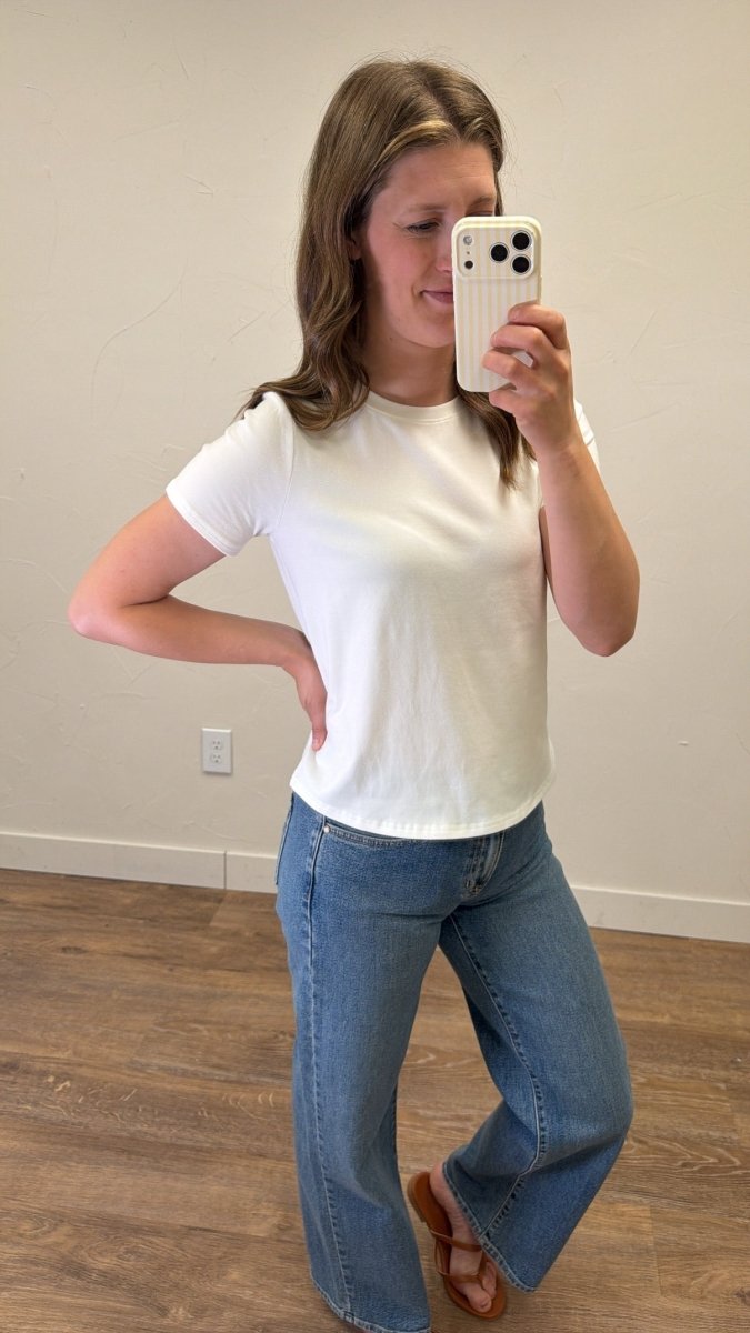 Lifestyle image of model wearing Tanya Tee in casual everyday styling — Three Boutique