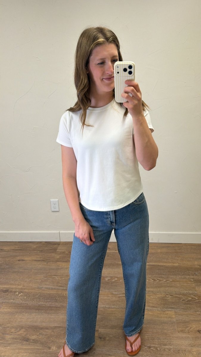 Lifestyle image of model wearing Tanya Tee in casual everyday styling — Three Boutique