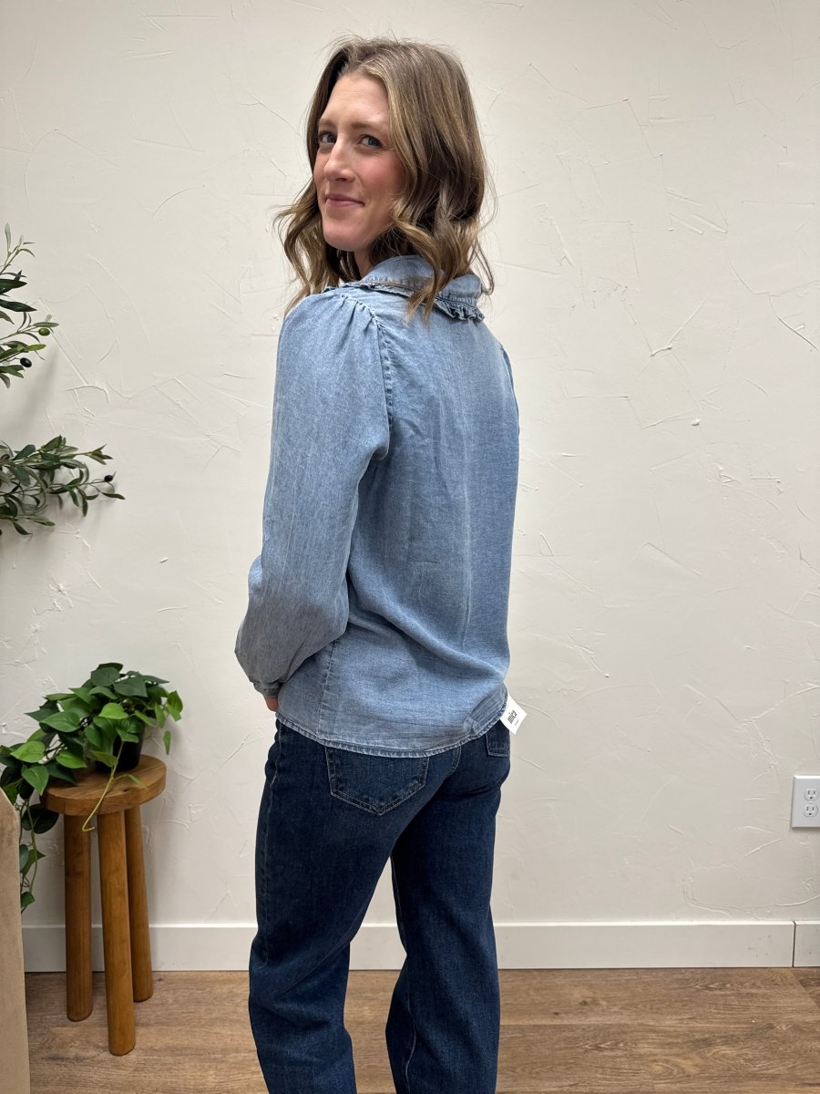 Side view of long sleeve button down shirt showing drape and silhouette — Three:Twelve Boutique
