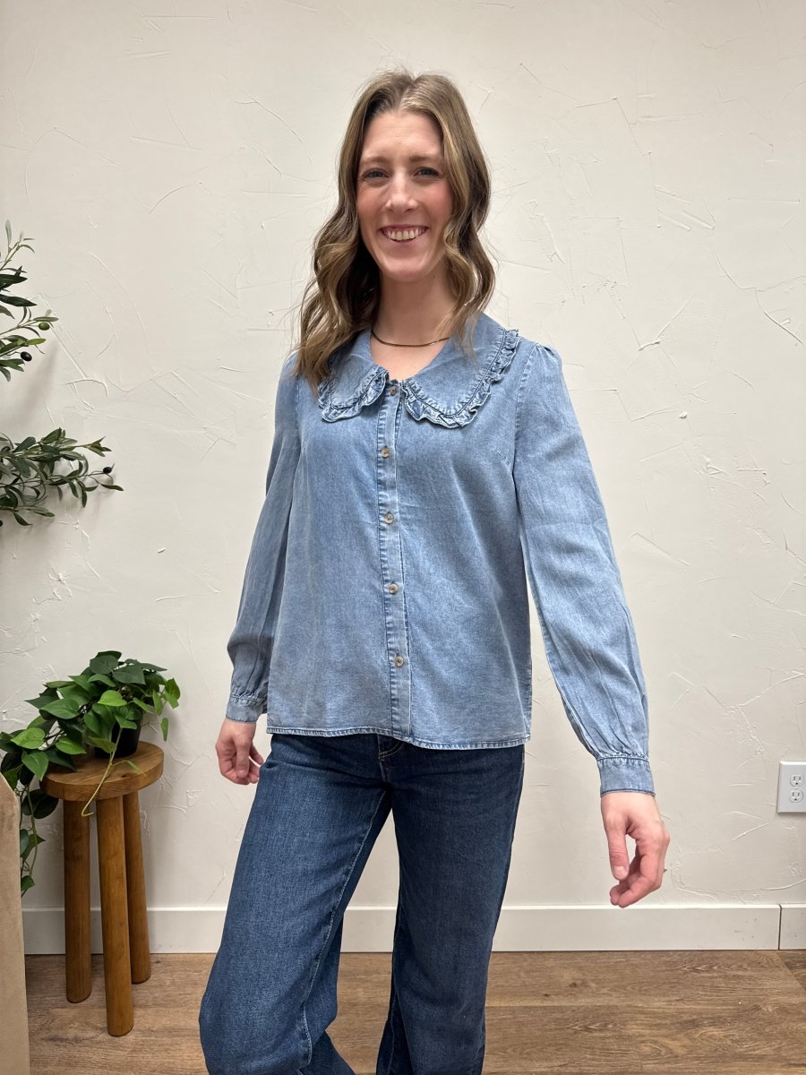 Lifestyle shot of model wearing denim shirt styled casually — Three:Twelve Boutique