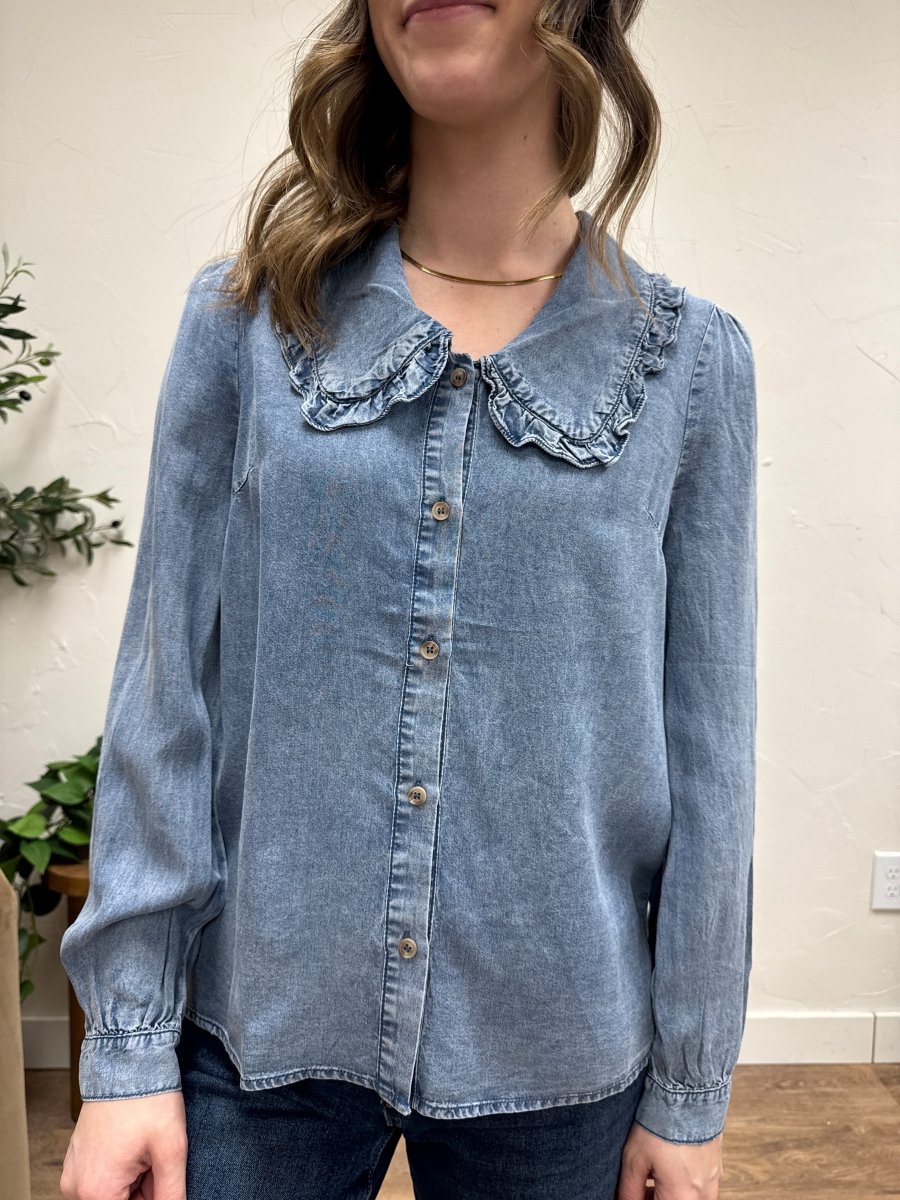 Front view of model wearing Tencel denim long sleeve button down shirt — Three:Twelve Boutique