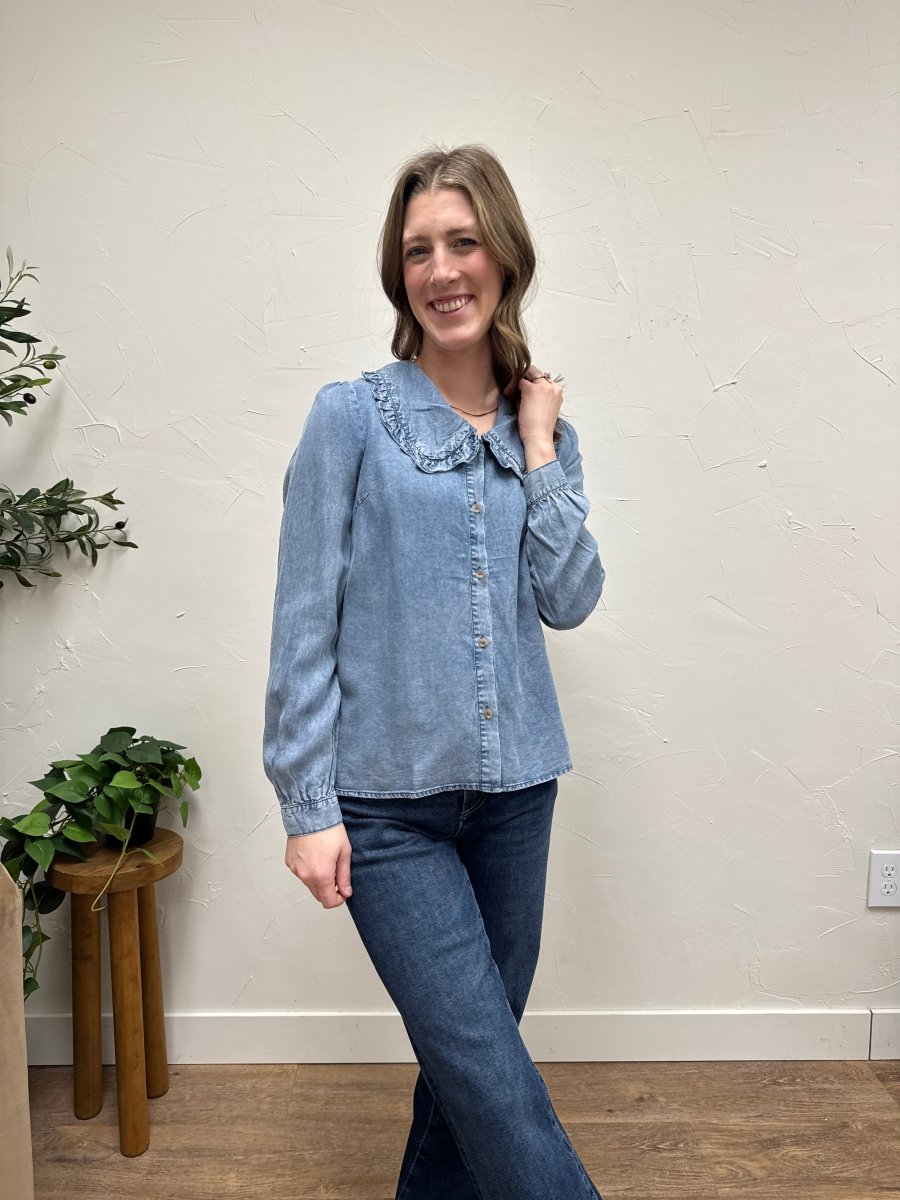 Lifestyle shot of model wearing denim shirt styled casually — Three:Twelve Boutique