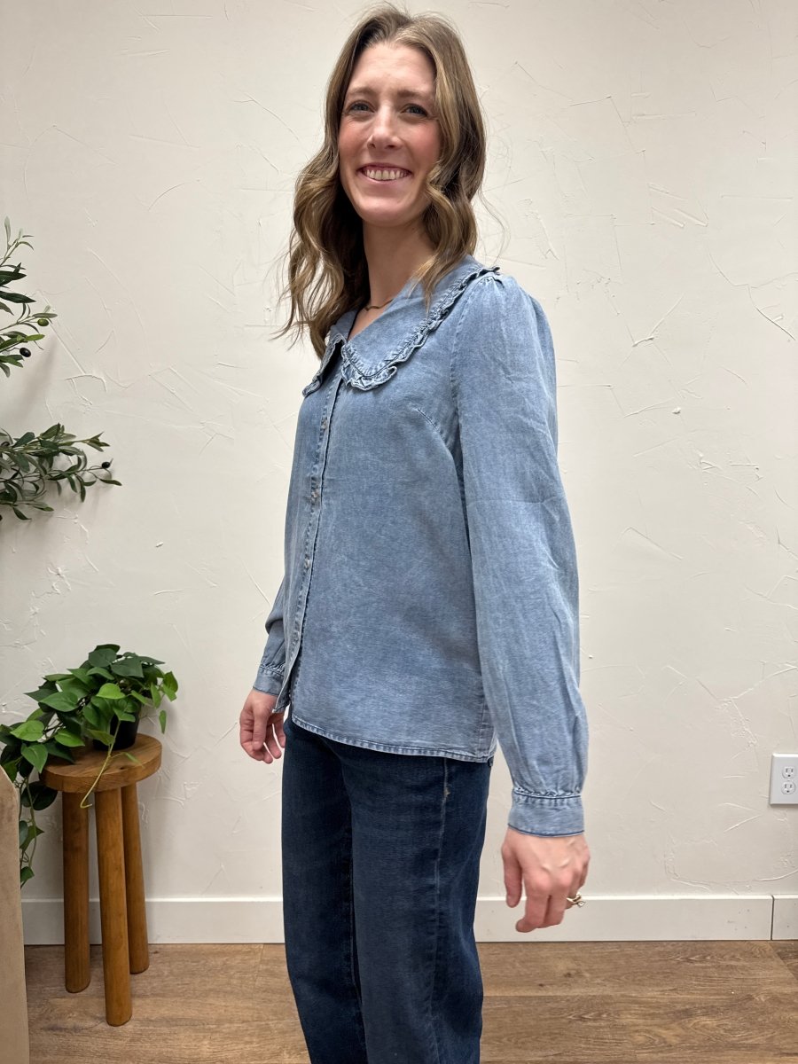 Side view of long sleeve button down shirt showing drape and silhouette — Three:Twelve Boutique