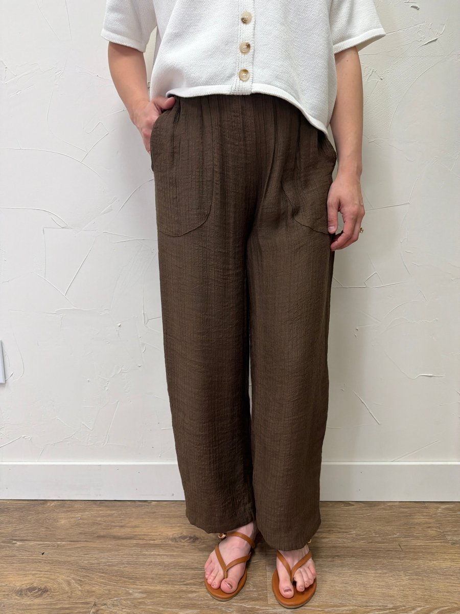 Lifestyle image of model styling Textured High Elastic Waist Lounge Pant — Three Boutique