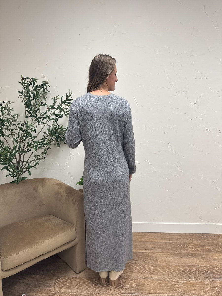 Back view of The Arden Dress on model showing loose draped fit — Three:Twelve Boutique