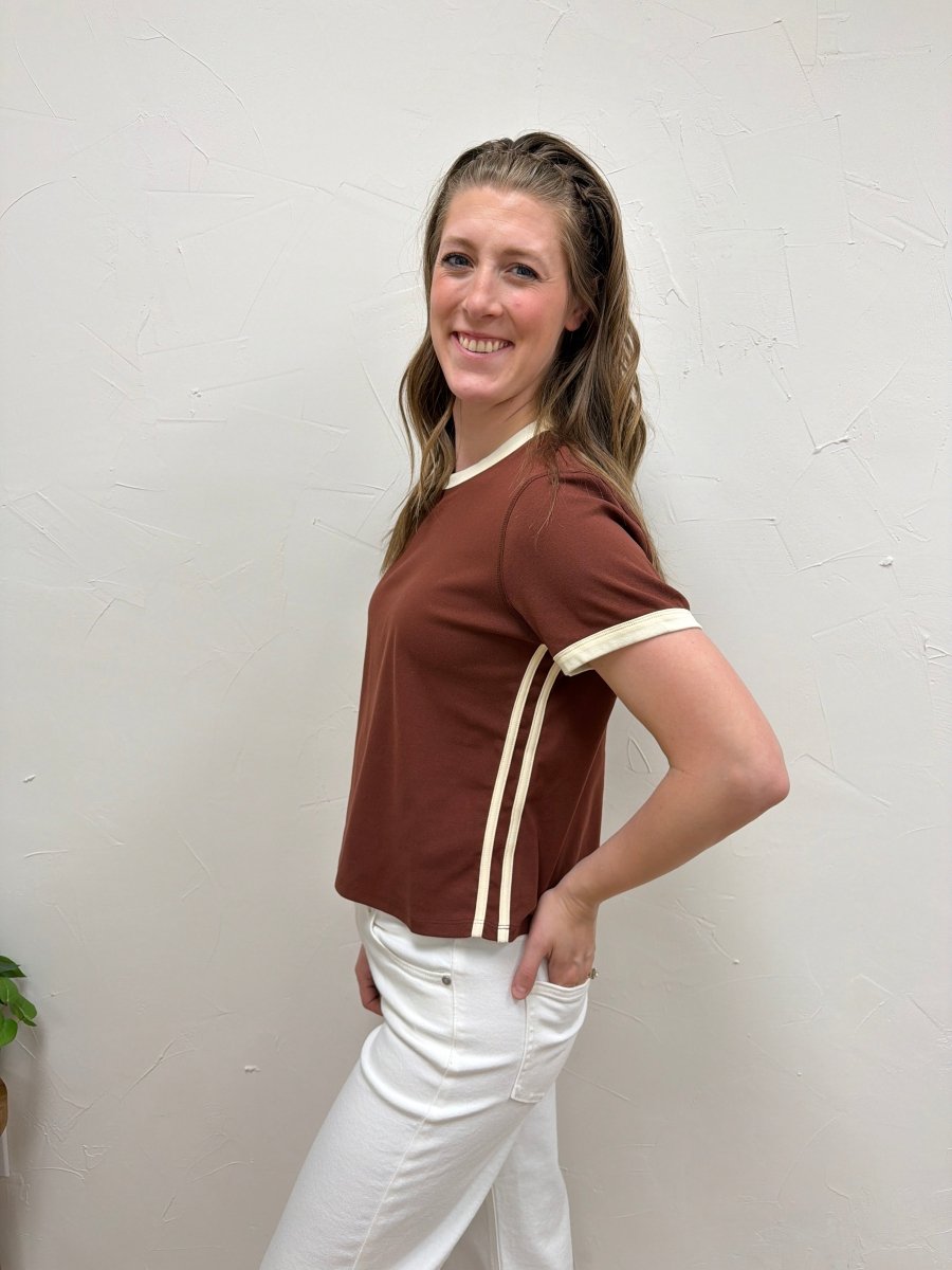 Side angle view of The Cait Top showing relaxed shape and sleeve detail — Three:Twelve Boutique